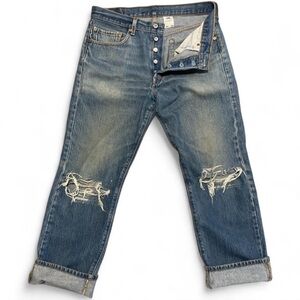 Levi's 501 distressed denim jeans